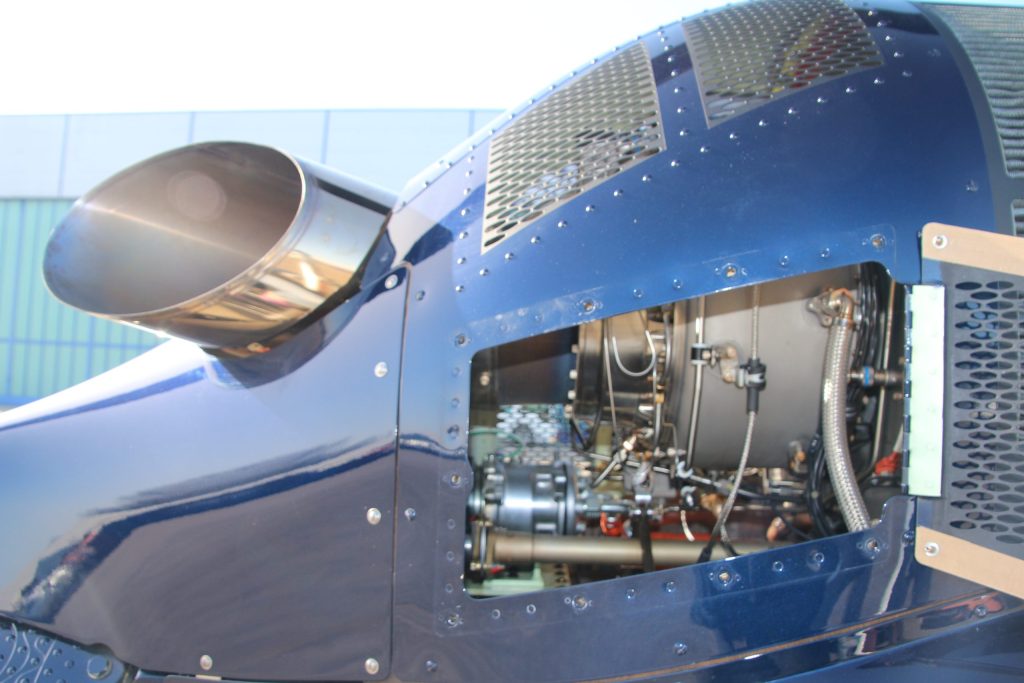 Close-up of a helicopter turbine engine detail on Helipaddy platform, showcasing aviation technology.